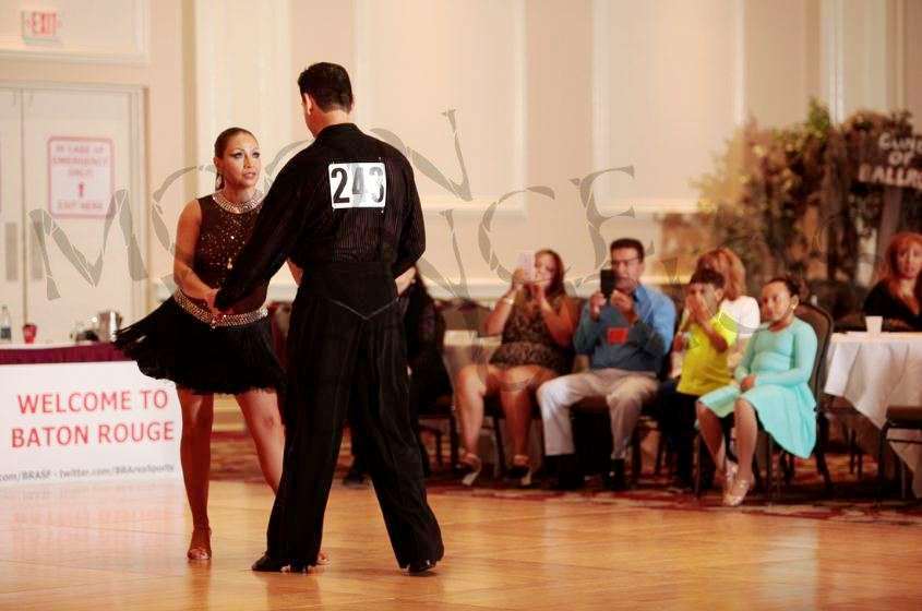 Dancing with amateur dance partner at competition