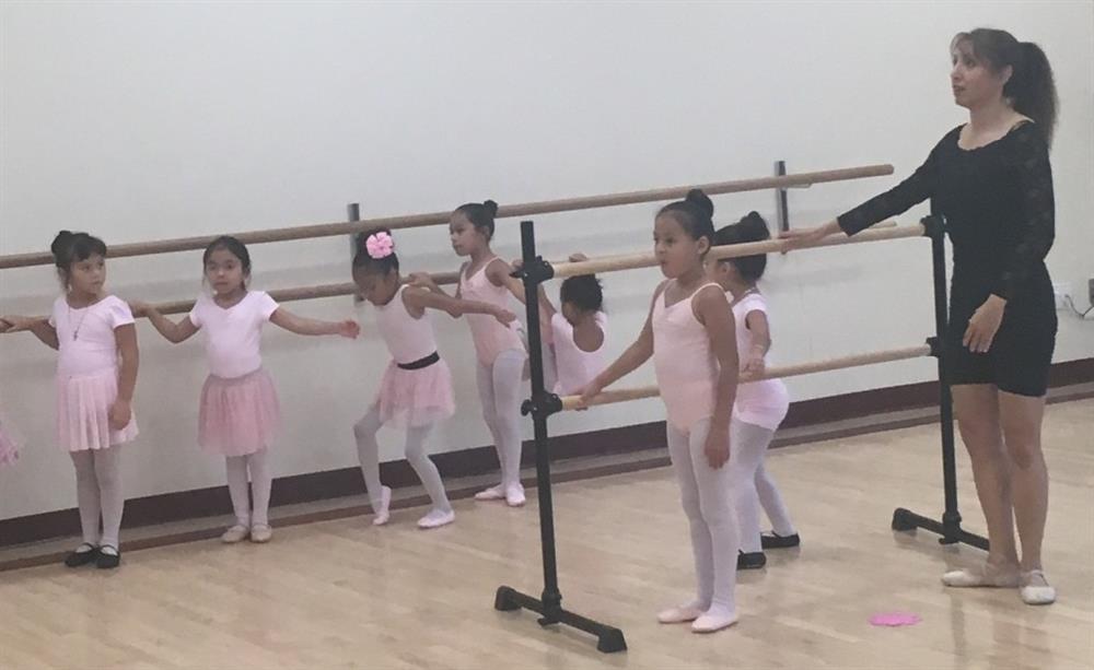 Children ballet dance class in Houston- work on barre
