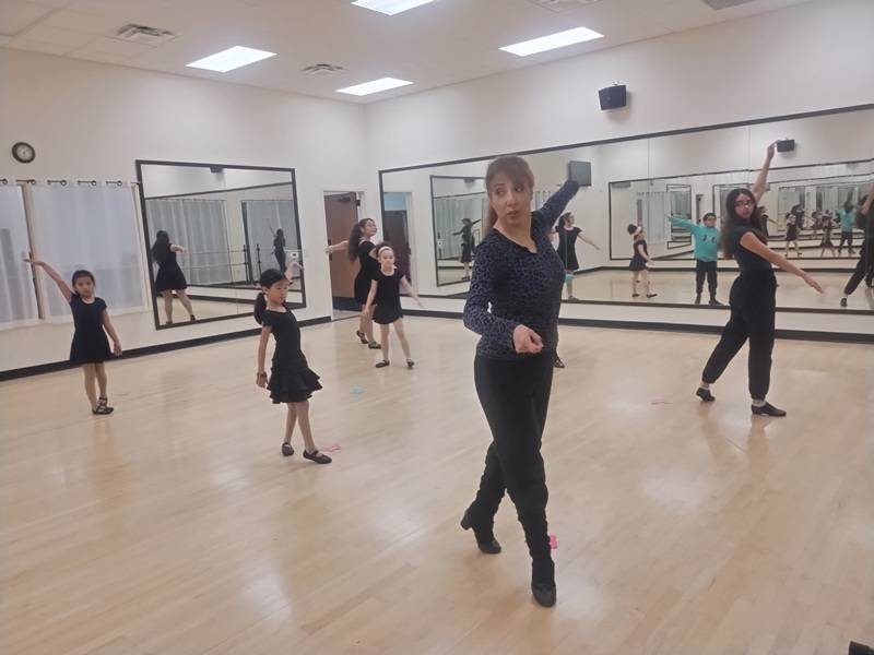 Child DanceSport (Ballroom and Latin) dance class in Houston- Learning ChaCha