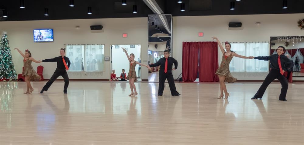 Performing in public at children dance performances at DanceSport Club in Houston
