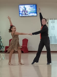 Denis Kojinov dancing with student