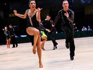 Denis Kojinov and Jeanette Chevalier dancing Latin