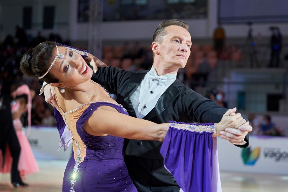 Denis Kojinov and Jeanette Chevalier. Standard at 2021 World DanceSport Championships 10-dance in Vagos, Portugal