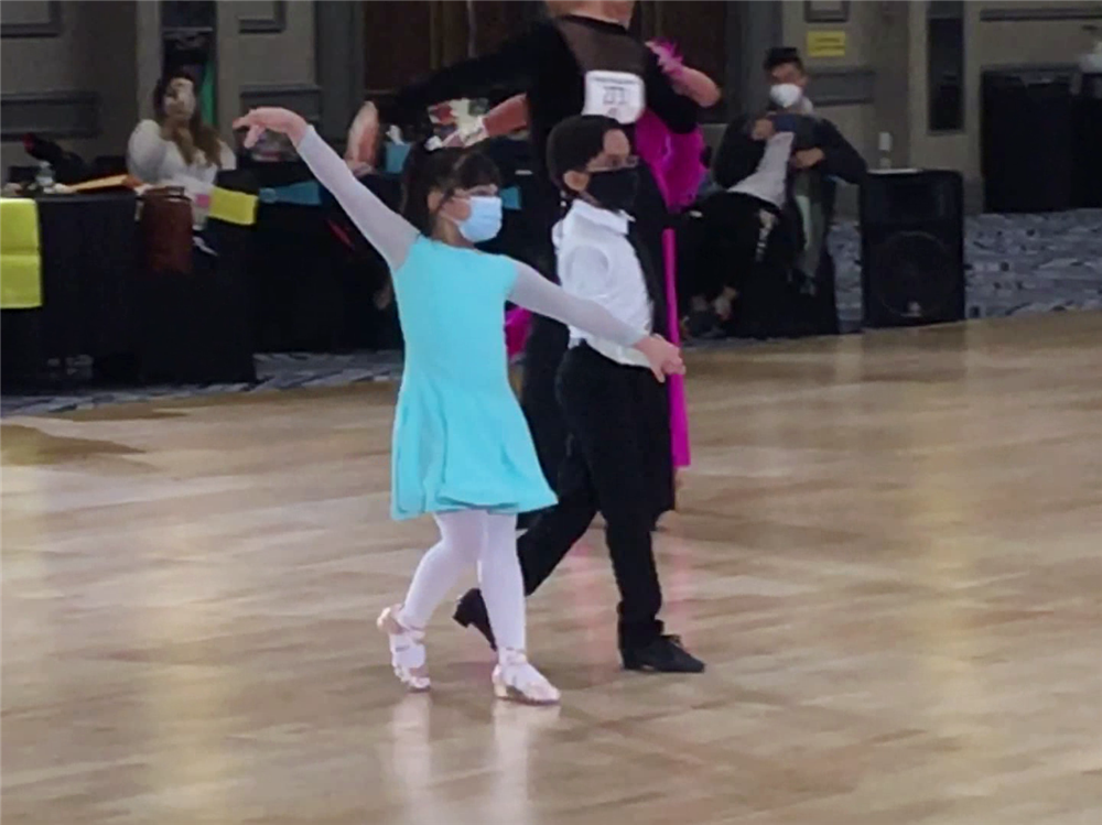 Toby and Leonor dancing ChaCha at Texas Challenge dance competition